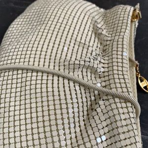 Mesh pouch style bag in cream w gold tone hardware